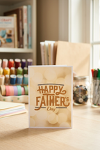 Handmade Father's Day card displayed in a craft room